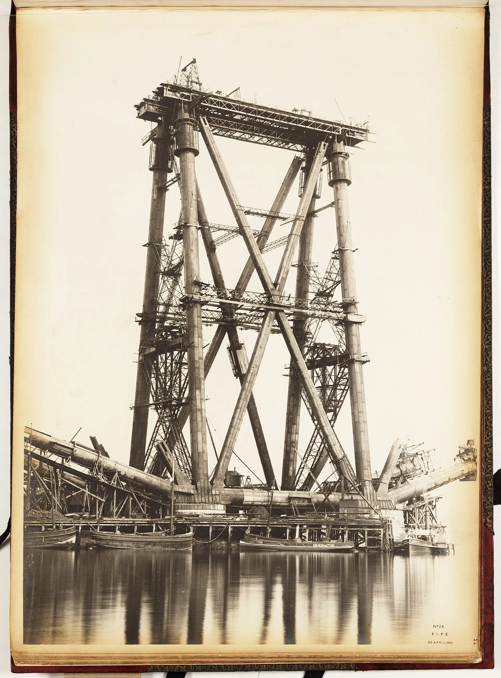 The Forth Bridge cantilevers under construction, photographed in the 1880s