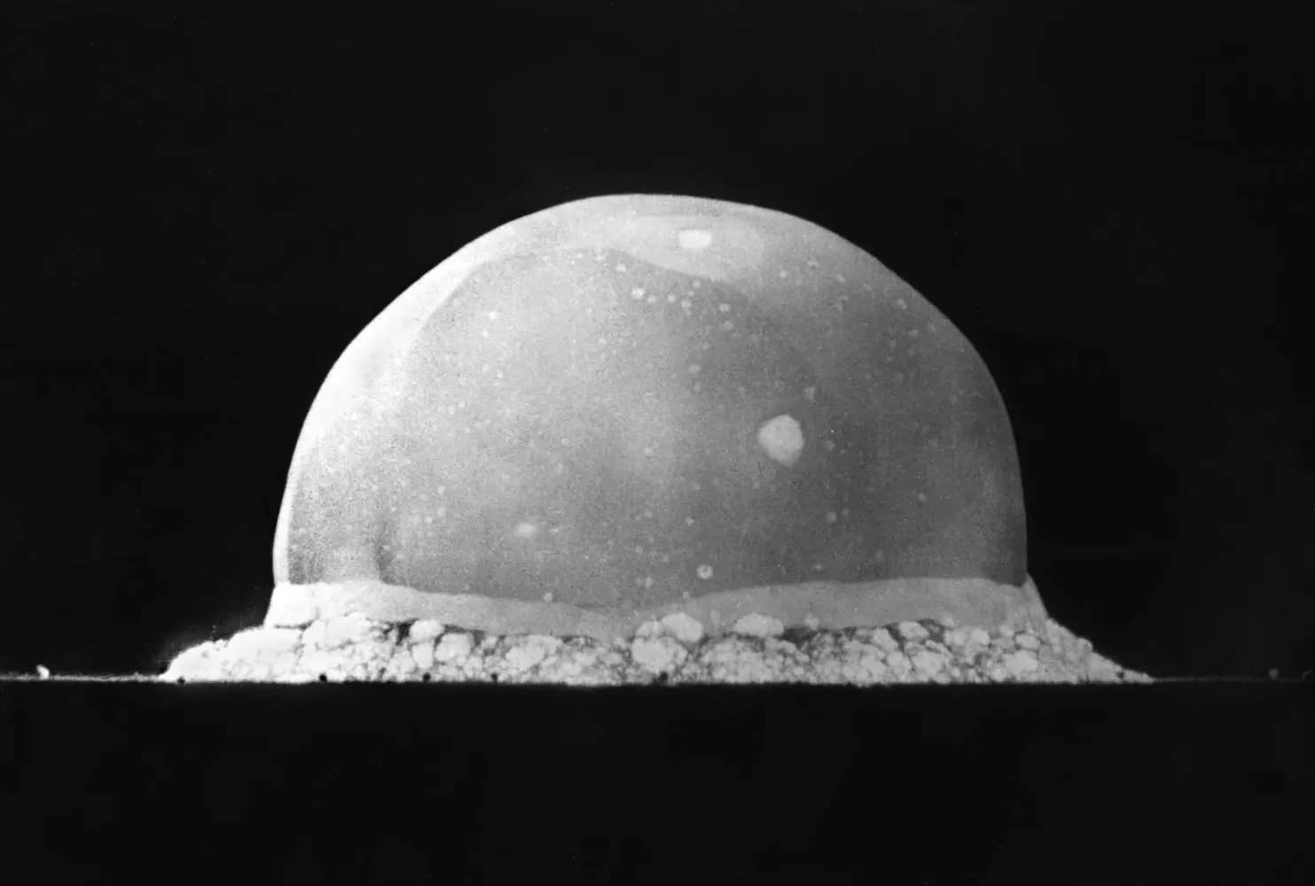 Expanding fireball dome of the first atomic bomb test at Trinity