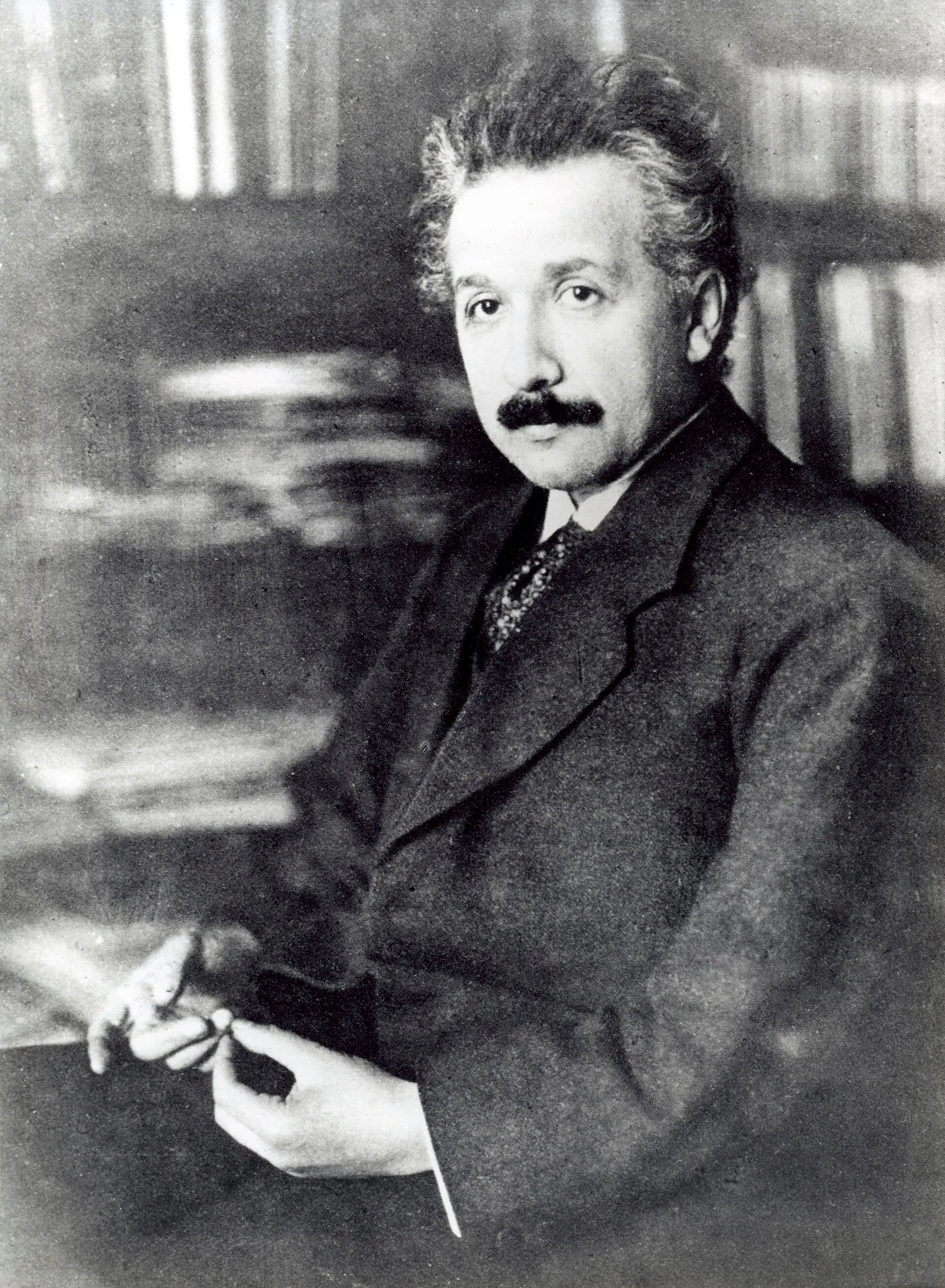 Albert Einstein in his study, photographed by Ferdinand Schmutzer