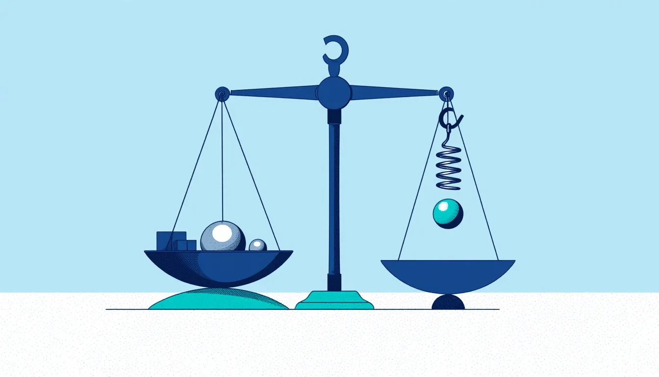 A beam balance and a hanging spring scale, illustrating the difference between mass and weight.