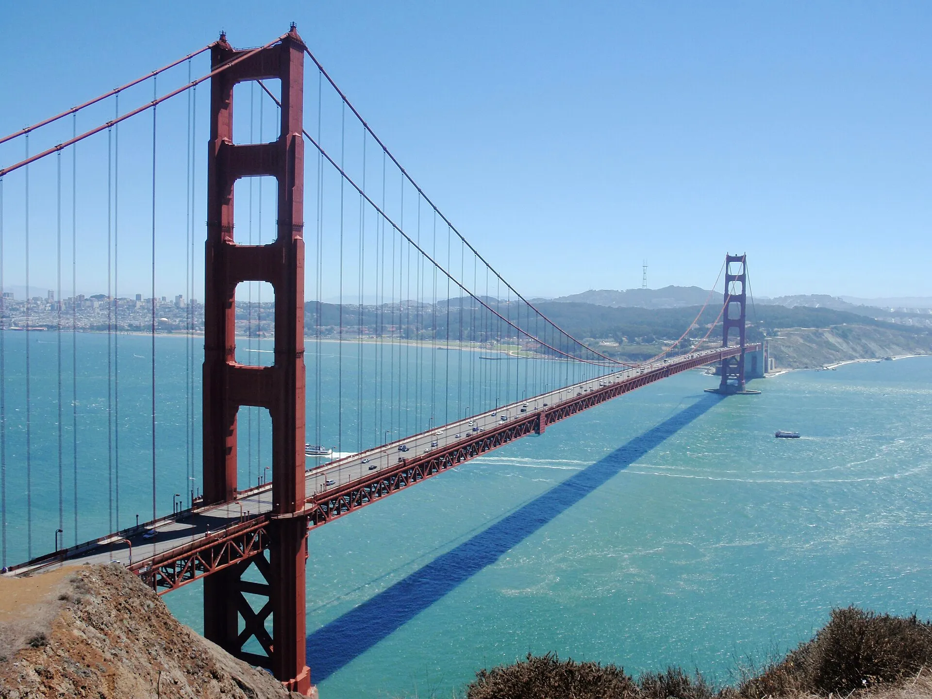 The Golden Gate Bridge spanning the bay with its twin red towers