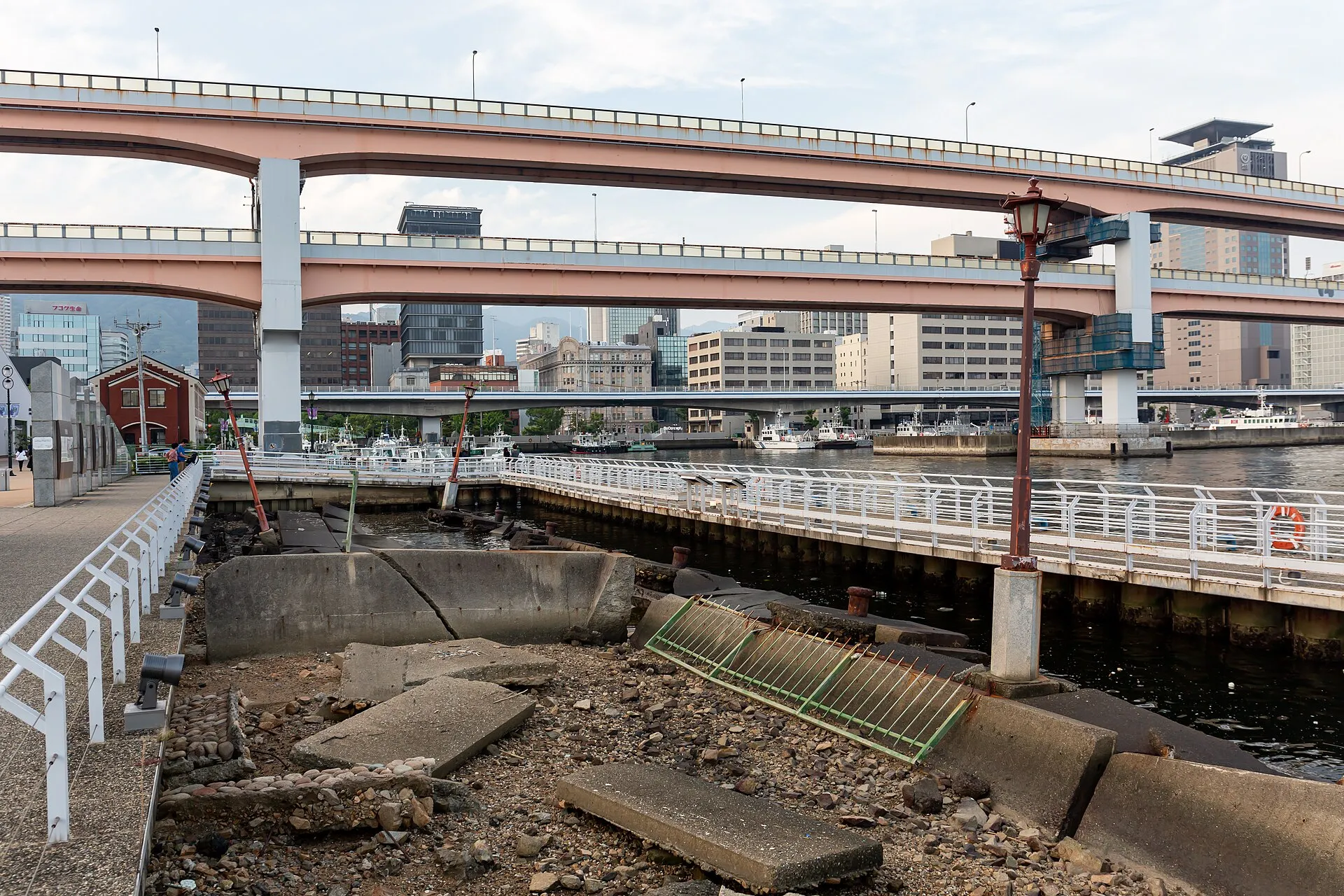 Earthquake-damaged roadway and collapsed embankment in Kobe in 1995