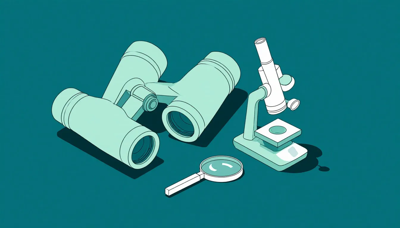 Binoculars, a magnifying glass, and a microscope arranged together as tools of zoological research